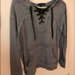 gray lounging sweatshirt